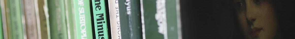 Old green paperback books in a row, an oil painting of a lady beside them.