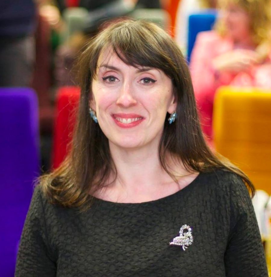 Author Mairi Kidd sitting at a Wigtown Book Festival event.